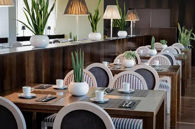 Un restaurante o sitio para comer en AC Hotel Ciudad de Tudela by Marriott