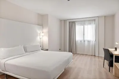 Cama o camas de una habitación en B&B HOTEL Ciudad de Lleida