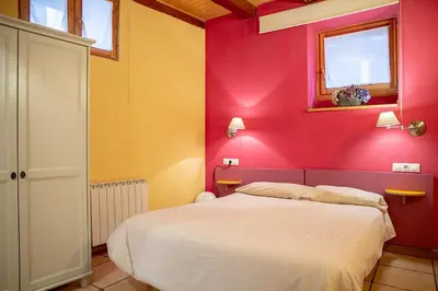 Cama o camas de una habitación en Garxo Apartamentos