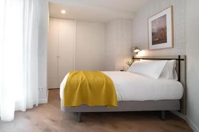 Cama o camas de una habitación en Apartamentos4U Tudela Plaza Parking Incluido