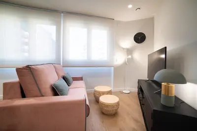 Una televisión o centro de entretenimiento en Apartamentos4U Tudela Plaza Parking Incluido