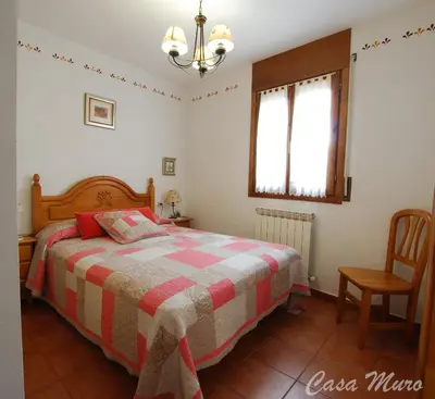 Cama o camas de una habitación en Casa Muro Ordesa