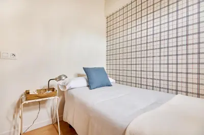 Cama o camas de una habitación en Centro historico,Atico con encanto con vistas a los Encierros de San Fermin