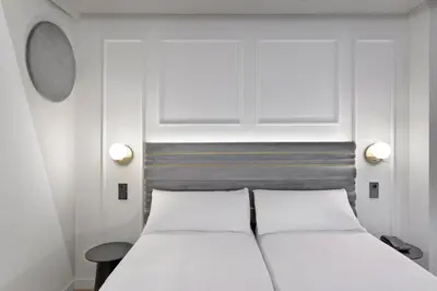 Cama o camas de una habitación en Hotel Inca