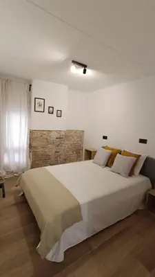 Cama o camas de una habitación en BOUTIQUE Apartment AVE Centro Lleida