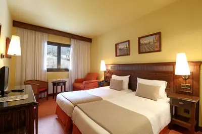 Cama o camas de una habitación en RVHotels Tuca