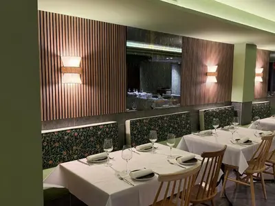 Un restaurante o sitio para comer en Hotel Real