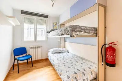 Cama o camas de una habitación en MUI Pamplona