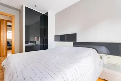 Cama o camas de una habitación en MUI Pamplona