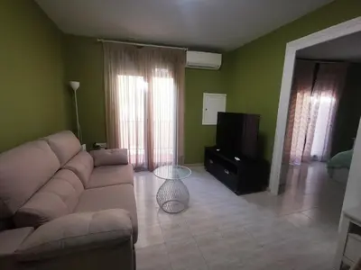 Una televisión o centro de entretenimiento en Apartamento el Pilar 3