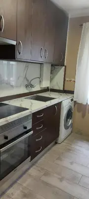 Una cocina o zona de cocina en Precioso piso-apartamento en barrio de Zaragoza