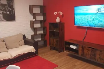 Una televisión o centro de entretenimiento en Precioso piso-apartamento en barrio de Zaragoza