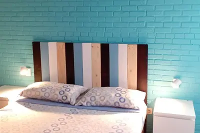 Cama o camas de una habitación en Precioso piso-apartamento en barrio de Zaragoza
