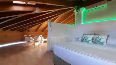 Cama o camas de una habitación en Dos Torres Númenor Ático Abuhardillado