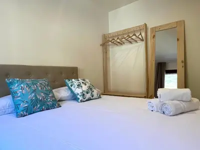 Cama o camas de una habitación en Espot Cowork & Apartments - L'Amfitriona