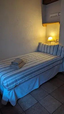 Cama o camas de una habitación en Cal Tous, La Socarrimada