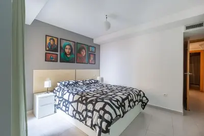 Cama o camas de una habitación en AR6 - Piso 2 dormitorios a 5 minutos del Pilar, posibilidad de parking no incluido