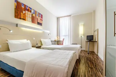 Cama o camas de una habitación en Hotel YIT Ciudad De Zaragoza
