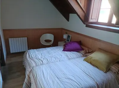 Cama o camas de una habitación en CHECK-IN CASAS Casa Plaza Mayor