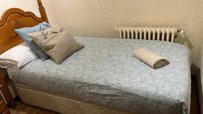 Cama o camas de una habitación en Casa Tere Panticosa