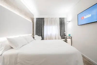Cama o camas de una habitación en Hotel Sansi Park
