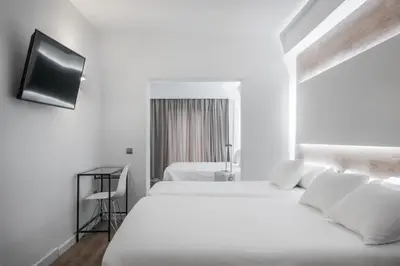 Cama o camas de una habitación en Hotel Sansi Park