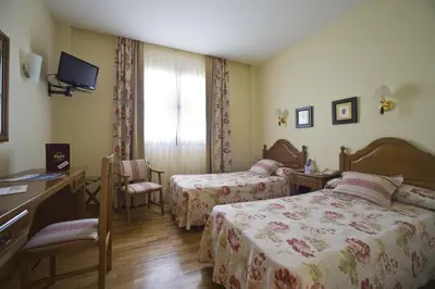 Cama o camas de una habitación en Hotel Ekai