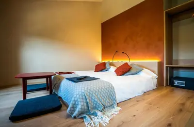 Cama o camas de una habitación en Hotel japonès Puigpinós