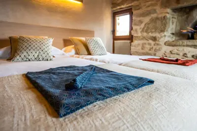 Cama o camas de una habitación en Hotel japonès Puigpinós