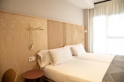 Cama o camas de una habitación en Hotel Dos Rios Origen