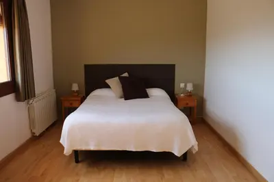 Cama o camas de una habitación en Hotel Balcó del Priorat