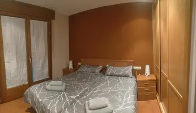 Cama o camas de una habitación en Apartamento Carlos Bielsa
