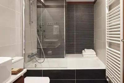 Un baño de Val de Ruda Luxe 69 by FeelFree Rentals