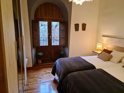 Cama o camas de una habitación en Espectacular apartamento reformado en edificio histórico, con WIFI