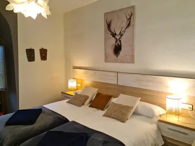 Cama o camas de una habitación en Espectacular apartamento reformado en edificio histórico, con WIFI