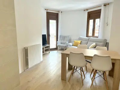 Una televisión o centro de entretenimiento en Apartament comfortable amb vistes i cèntric by RURAL D'ÀNEU