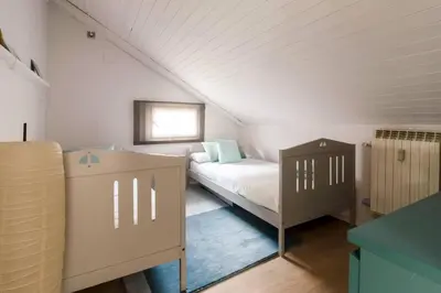Cama o camas de una habitación en Precioso Ático duplex en vielha para 6 pax