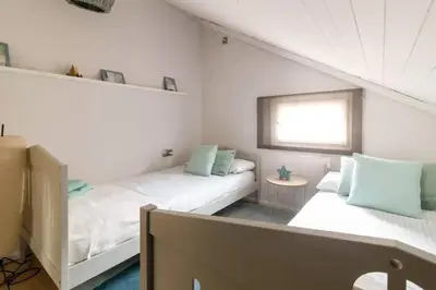 Cama o camas de una habitación en Precioso Ático duplex en vielha para 6 pax