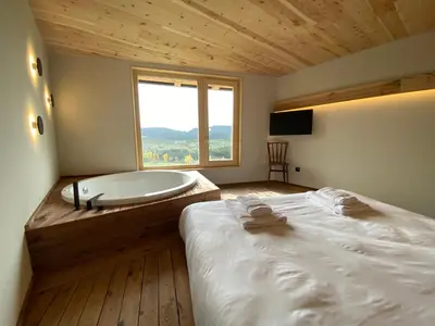 Cama o camas de una habitación en Casa amb jacuzzi privat, Cal Rossa