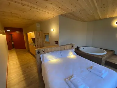 Cama o camas de una habitación en Casa amb jacuzzi privat, Cal Rossa