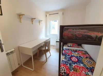 Cama o camas de una habitación en Acogedor piso en el centro de Sabiñanigo