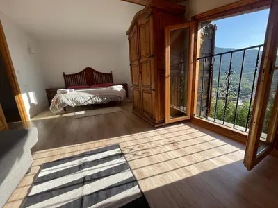 Cama o camas de una habitación en Casa Rural Uría - Ubicación perfecta, rodeado de naturaleza, vistas espectaculares