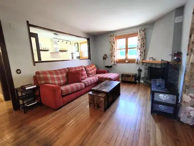 Zona de estar de CHECK-IN CASAS Cumbre de Benasque