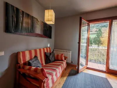 Zona de estar de Cómodo y equipado, ideal para tu estancia en la Vall de Boí - Erta 1