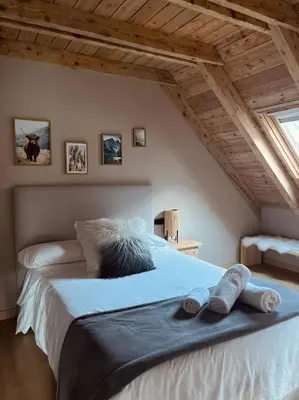 Cama o camas de una habitación en Ca de Palomera Vall d’Aran