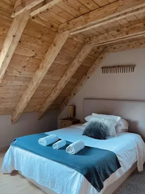 Cama o camas de una habitación en Ca de Palomera Vall d’Aran