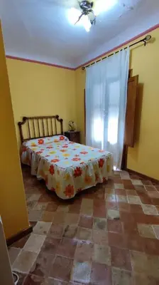 Cama o camas de una habitación en Casa rural LA CRIVA