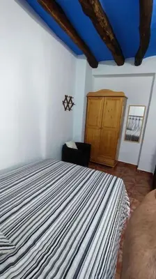 Cama o camas de una habitación en Casa rural LA CRIVA