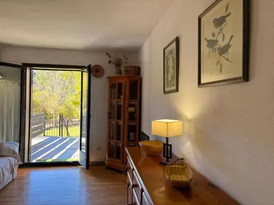 Cama o camas de una habitación en Planta baja con terraza soleada y jardín - Besiberri 1