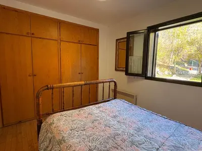 Cama o camas de una habitación en Planta baja con terraza soleada y jardín - Besiberri 1